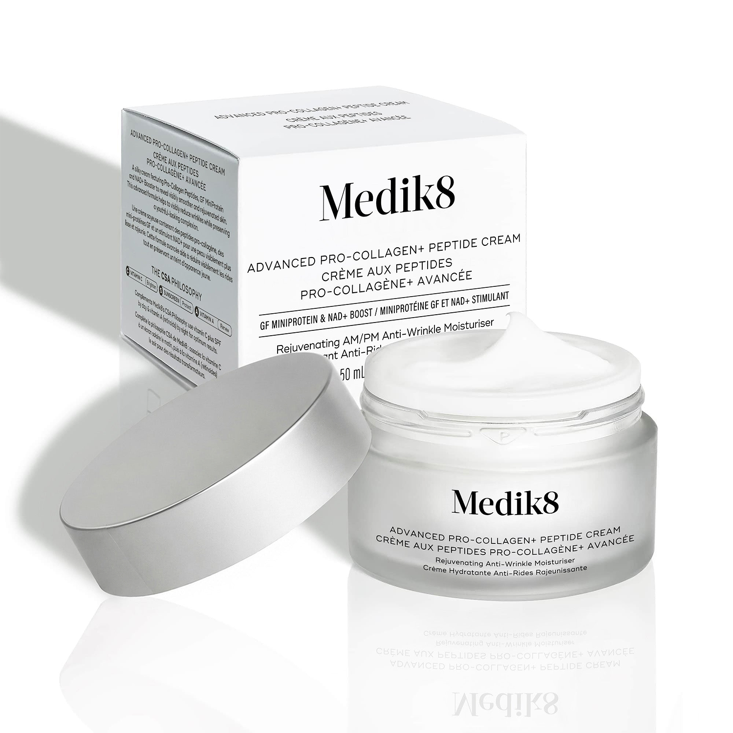 Een witte productverpakking van Advanced Pro-Collagen+ Peptide Cream Mask staat naast het product.