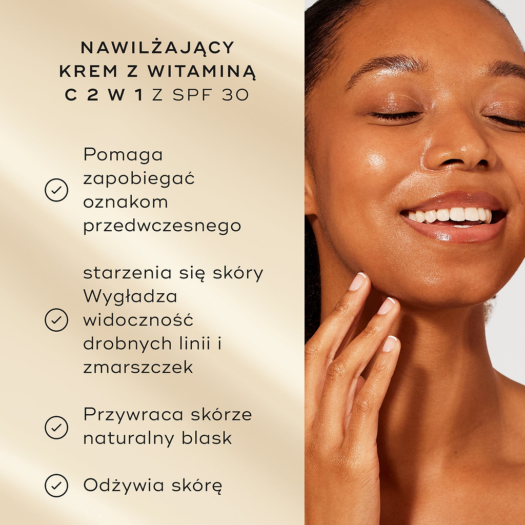 Modelka o promiennej cerze uśmiecha się obok listy zalet produktu na delikatnym złotym tle. Tekst podkreśla zalety kremu nawilżającego 2 w 1 z witaminą C i filtrem SPF 30:
Zapobiega oznakom przedwczesnego starzenia się skóry
Wzmacnia blask skóry
Nawilża cerę
100% użytkowników zgadza się, że ich skóra czuje się chroniona przez cały dzień