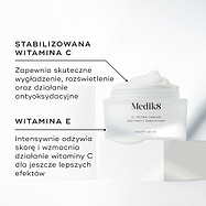 Słoiczek kremu Medik8 C-Tetra przedstawiony w stanie otwartym na białym kamiennym bloku na czystym białym tle. Na zdjęciu widoczne są dwa kluczowe składniki oraz ich zalety:

STABILIZOWANA WITAMINA C: Zapewnia silne działanie wygładzające, rozjaśniające oraz przeciwutleniające.

WITAMINA E: Głęboko odżywia i wzmacnia działanie witaminy C, zapewniając maksymalne efekty.