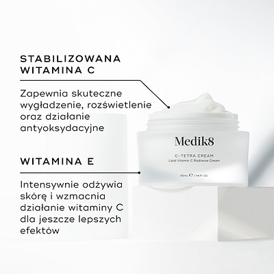 Słoiczek kremu Medik8 C-Tetra przedstawiony w stanie otwartym na białym kamiennym bloku na czystym białym tle. Na zdjęciu widoczne są dwa kluczowe składniki oraz ich zalety:

STABILIZOWANA WITAMINA C: Zapewnia silne działanie wygładzające, rozjaśniające oraz przeciwutleniające.

WITAMINA E: Głęboko odżywia i wzmacnia działanie witaminy C, zapewniając maksymalne efekty.