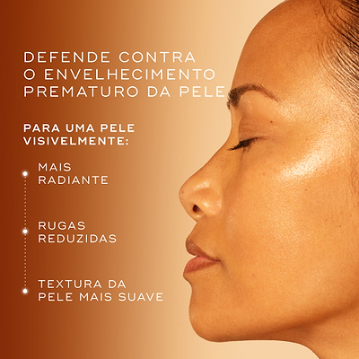 O perfil lateral do rosto de uma mulher com pele iluminada é mostrado sobre um fundo degradê laranja quente. O texto destaca que o produto defende contra o envelhecimento prematuro para uma pele visivelmente mais radiante, com rugas reduzidas e textura mais suave.