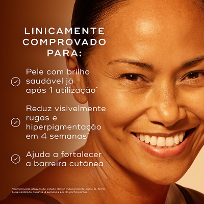 Close-up de uma mulher sorridente com pele luminosa contra um fundo quente. Os marcadores afirmam que é clinicamente comprovado para proporcionar um brilho saudável após 1 utilização, reduzir visivelmente rugas e hiperpigmentação em 4 semanas, e ajudar a fortalecer a barreira cutânea.