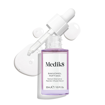 A purple glass dropper bottle of Bakuchiol Peptides serum, with its dropper removed. A swirl of the serum is shown, emphasising the product's texture.
