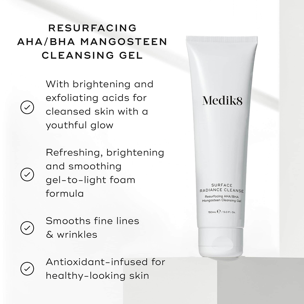 Medik8 Surface Radiance Cleanse tube on a bright background with checkmark graphics. Text highlights its benefits: brightening and exfoliating acids for a youthful glow, refreshing and smoothing gel-to-light foam formula, smooths fine lines and wrinkles, and antioxidant-infused for healthy-looking skin.