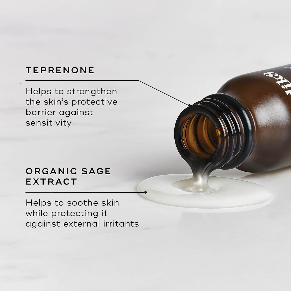 Close-up of an open amber glass bottle of Medik8 Calmwise Serum tipped on its side, pouring a pool of liquid onto a light surface. Text highlights key ingredients: Teprenone (helps strengthen the skin’s protective barrier against sensitivity) and Organic Sage Extract (helps soothe skin while protecting it against external irritants).