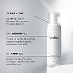 A Medik8 Calmwise Soothing Cleanser bottle displayed on a white block. Lines connect the bottle to text explaining key ingredients: "Teprenone" to soothe redness, "Chlorophyll" to purify skin, and "Vitamin K2" to support skin strength.