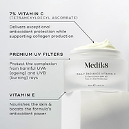 Medik8 Daily Radiance Vitamin C open glass jar displayed against a warm gold background with ingredient callouts. Text highlights 7% Vitamin C (Tetrahexyldecyl Ascorbate) for antioxidant protection and collagen support, Premium UV Filters for UVA and UVB protection, and Vitamin E to nourish the skin and boost antioxidant power.