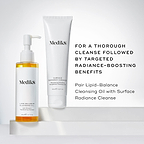 Lipid-Balance Cleansing Oil bottle stands beside a tube of Surface Radiance Cleanse. Text recommends pairing the two for a "thorough cleanse followed by targeted radiance-boosting benefits".