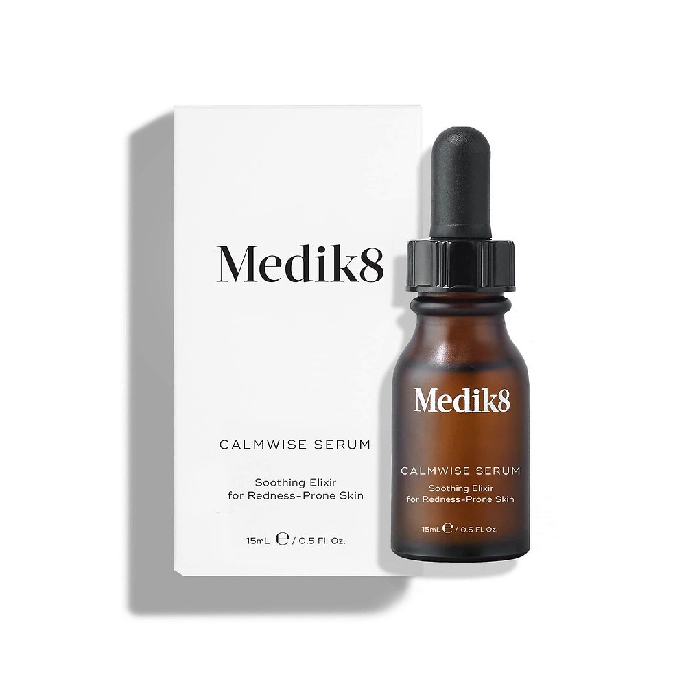 A 15mL amber glass dropper bottle of Medik8 Calmwise Serum standing next to its white cardboard carton against a clean white background. Text on both the bottle and carton describes it as a "Soothing Elixir for Redness-Prone Skin."