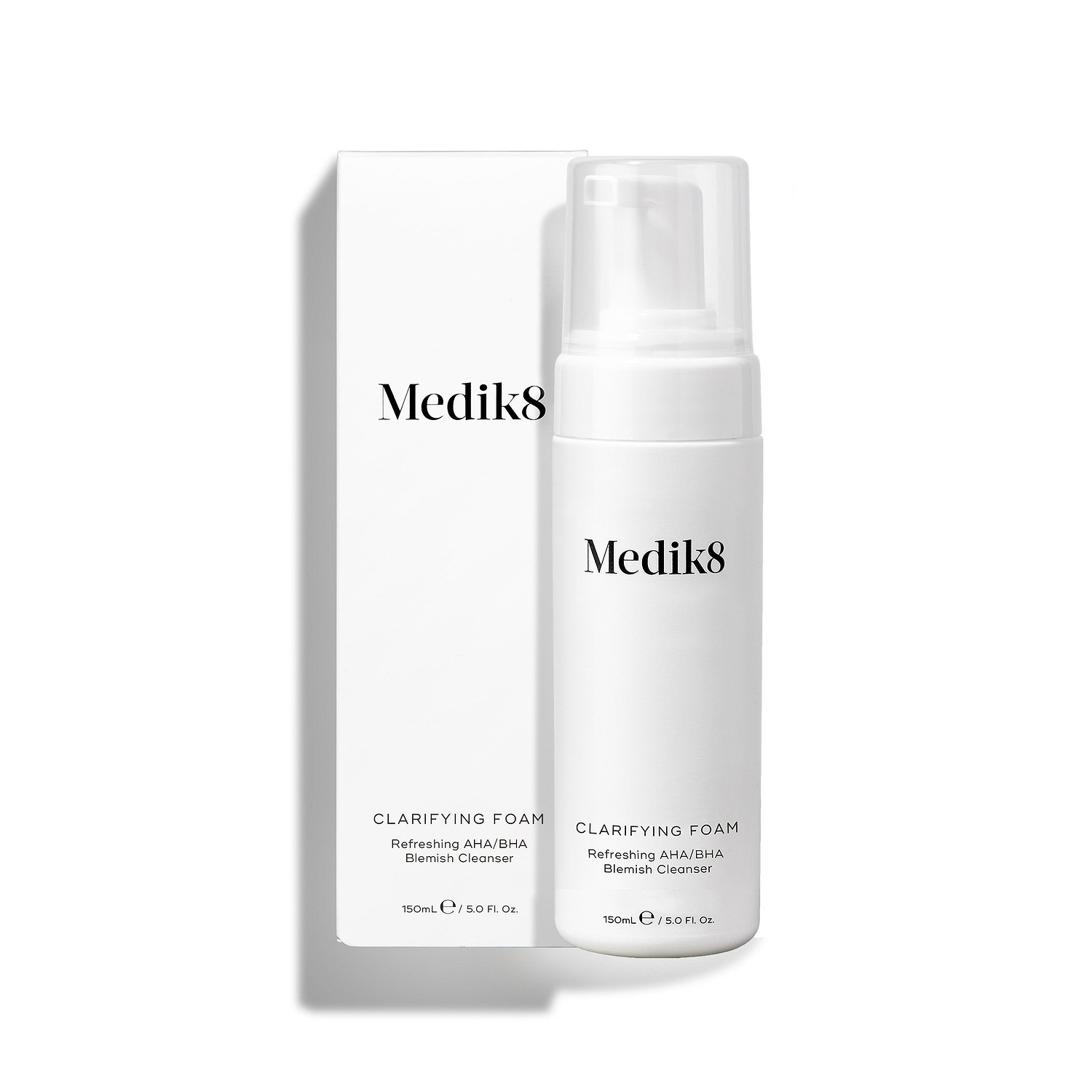 Medik8 Clarifying Foam pump bottle stands next to its matching white outer carton on a clean white background. Text on both identifies the product as a 150mL Refreshing AHA/BHA Blemish Cleanser.
