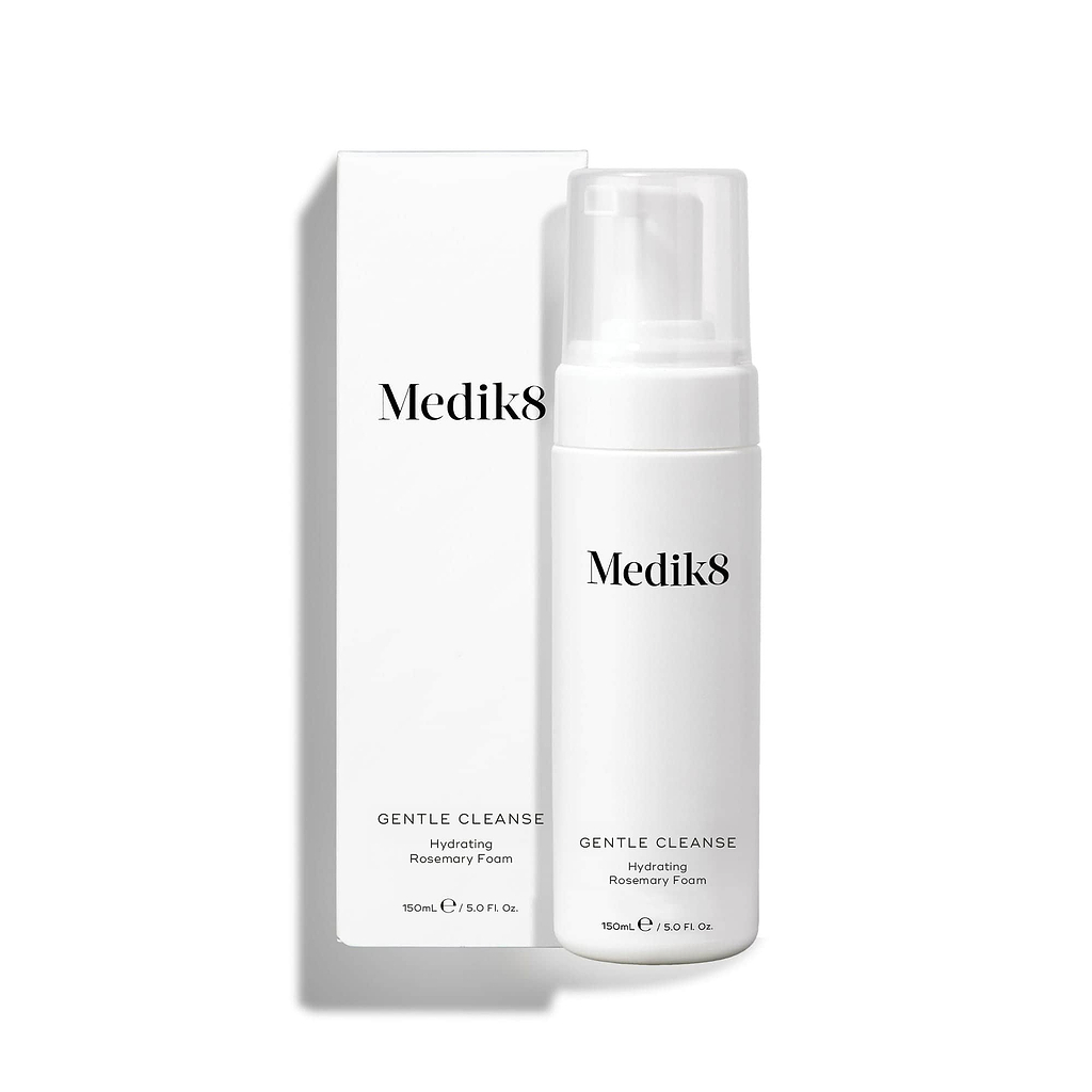 A Medik8 Gentle Cleanse pump bottle standing next to its white packaging box on a white background. Text on the bottle identifies it as a "Hydrating Rosemary Foam."