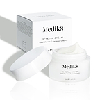 Medik8 C-Tetra Cream jar and its white cardboard carton displayed on a clean white background with soft shadows. The open white, frosted-glass jar features the Medik8 logo and is labelled "C-TETRA CREAM Lipid Vitamin C Radiance Cream" in a 50mL size. A thick swirl of white cream is visible on top of the jar, with the white box behind it showing the product name and a partial ingredients list.