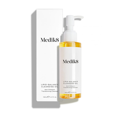 Medik8 Lipid-Balance Cleansing Oil bottle stands next to its white packaging carton. Text highlights the "Anti-Pollution Transforming Cleanser" formula and 140mL size.