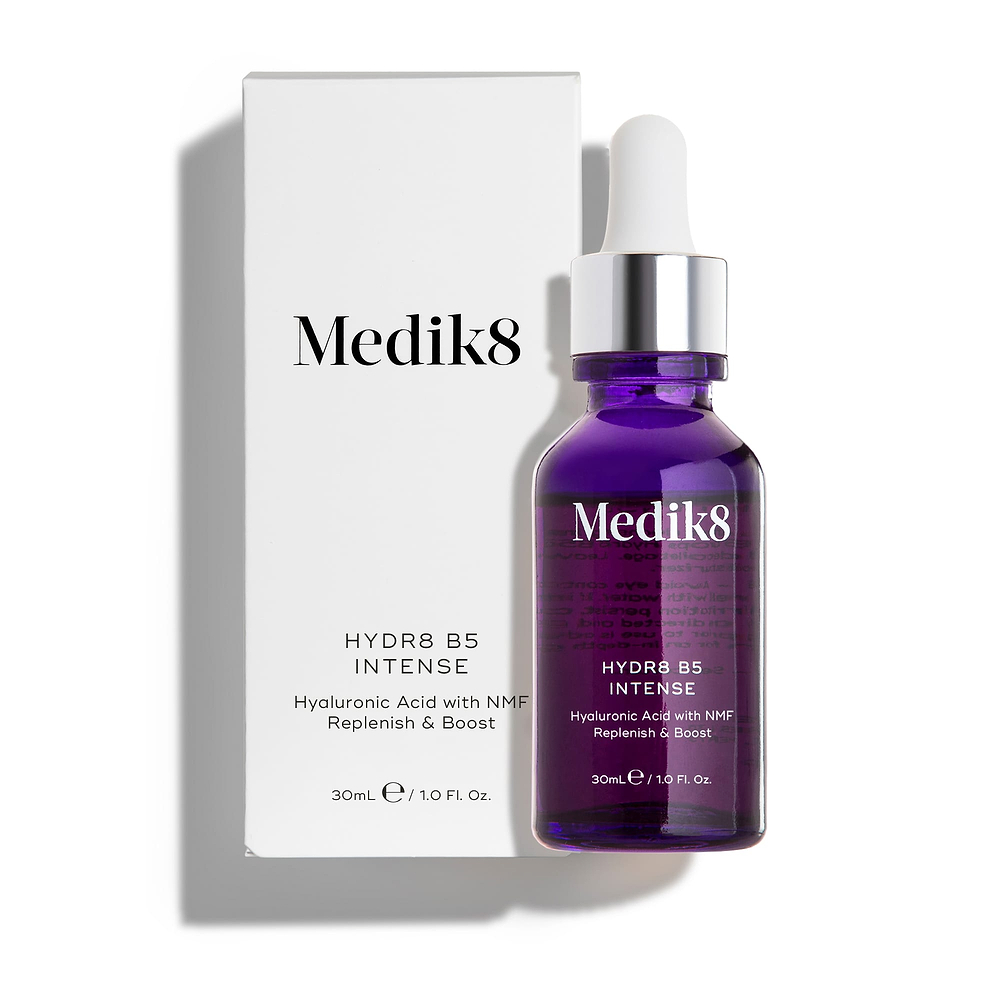 Medik8 Hydr8 B5 Intense glass dropper bottle stands next to its matching white outer carton on a clean white background. Text on both identifies the product as a 30mL Hyaluronic Acid with NMF serum designed to Replenish & Boost.
