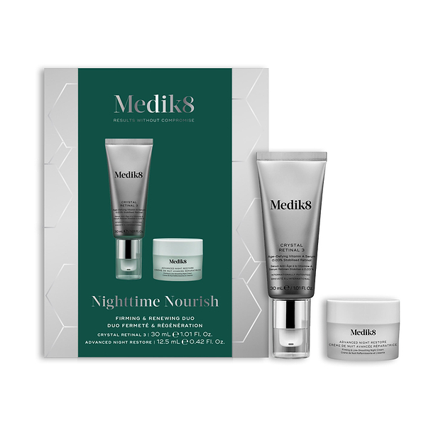 A Medik8 "Nighttime Nourish" gift box displayed on a white background with a dark green center and hexagonal graphics, showing the printed products inside. A Crystal Retinal 3 tube and an Advanced Night Restore travel size jar stand loose beside the box.