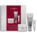 A Medik8 "Rejuvenation Routine" gift box displayed on a white background with a deep red center and hexagonal graphics, showing the printed products inside. A Daily Radiance Vitamin C jar, Crystal Retinal 3 tube, and Exo-PDRN Prismatic+ deluxe sample stand loose beside the box.