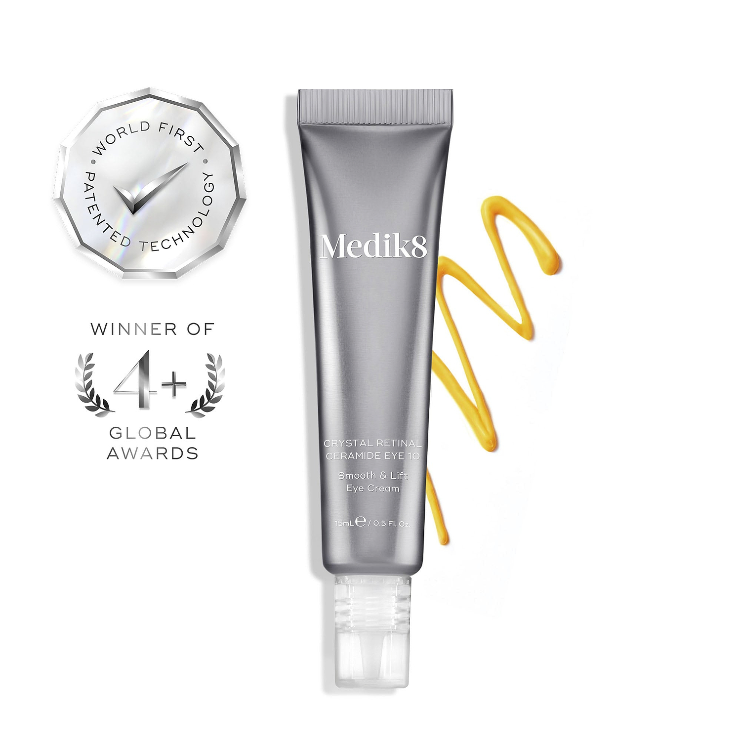 Medik8 Crystal Retinal Ceramide Eye 10 cream tube beside a zigzag swatch of yellow cream on a white background. Two silver badges highlight "WINNER OF 4+ GLOBAL AWARDS" and "WORLD FIRST PATENTED TECHNOLOGY".