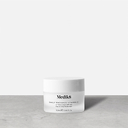 A 12.5ml white jar of Medik8 Daily Radiance Vitamin C, labeled 'C-Tetra Cream SPF 30 Two-in-One Moisturiser,' stands on a grey surface against a clean white background.